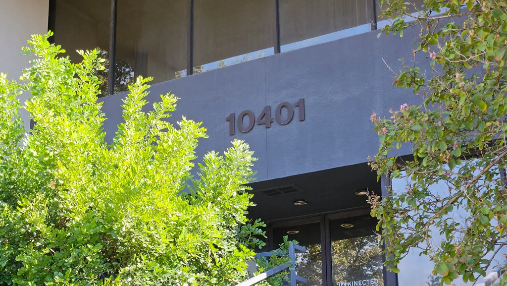 Building address number 10401 displayed in large letters above the main entrance